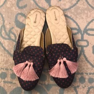 Birdies navy with pink tassel slippers.
